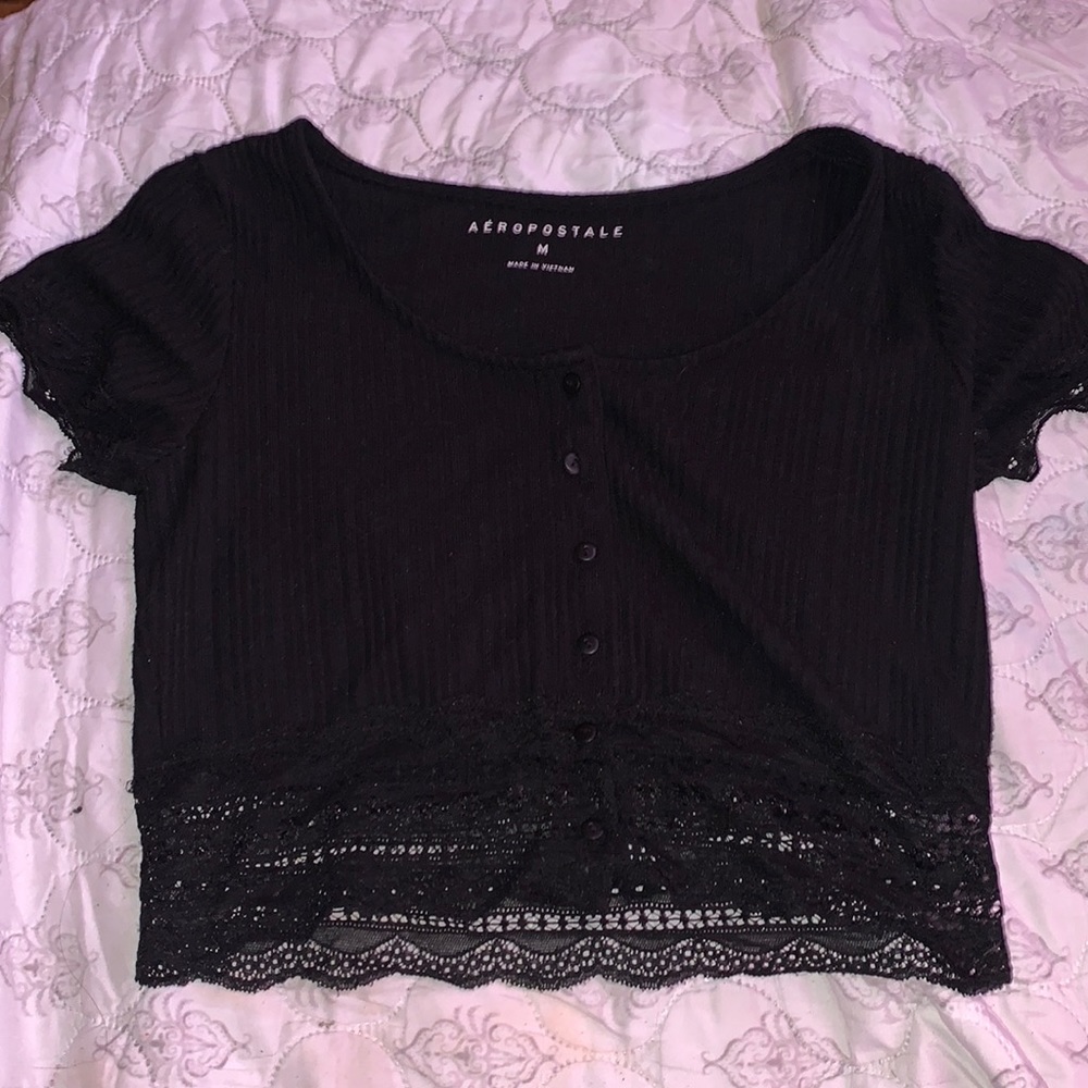 A repostal crop button up is a medium